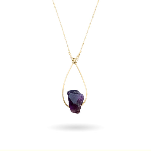 A deep violet-colored natural rough Amethyst gemstone set on a 14K gold-fill pendant and strung along a dainty paper clip cable chain, then finished with a vintage-inspired pearl box clasp. Amethyst is the birthstone for those born in the month of February (Aquarius/Pisces) and the stone for commemorating 6th wedding anniversaries! 