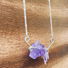 Load image into Gallery viewer, Natural rough Amethyst gemstones are suspended between two abstract sterling silver butterfly wings, attached to a dainty sterling silver satellite curb chain, and finished with a vintage-inspired pearl box clasp. 
