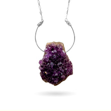 Load image into Gallery viewer, This natural rough Amethyst geode from the mines of Hiddenite, NC is set on a solid sterling silver semi-circle pendant attached to a long ornate sterling silver art-deco style chain and finished with a vintage-inspired pearl box clasp. 
