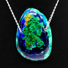 Load image into Gallery viewer, Close up: This stunning and wonderfully delicate natural mined Azurite Malachite Chrysocolla Pendant from Peru is large (85 Carats) and is strung on a sterling silver satellite curb chain and is perfect for anytime of day or night as a statement piece or for layering with other necklaces. A perfect gift for yourself AND as a gift for friends, mothers, sisters, aunts, cousins and grandmothers for a birthday, anniversary, graduation, bat mitzvah, Christmas or Hanukkah!
