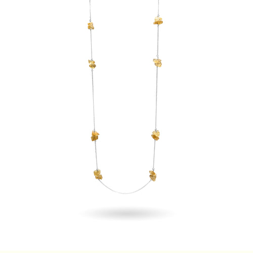 Gorgeous clusters of rough Citrine gemstones are strung along a dainty sterling silver curb chain and finished with a vintage-inspired pearl box clasp. An edgy yet sophisticated and modern piece, this super long (43 inches) Citrine station necklace is perfect for wearing on its own or as as a part of a layering stack. 