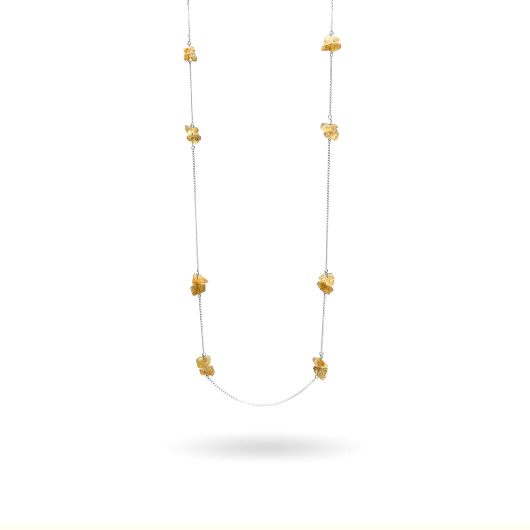 Gorgeous clusters of rough Citrine gemstones are strung along a dainty sterling silver curb chain and finished with a vintage-inspired pearl box clasp. An edgy yet sophisticated and modern piece, this super long (43 inches) Citrine station necklace is perfect for wearing on its own or as as a part of a layering stack. 