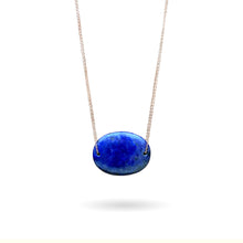 Load image into Gallery viewer, Lapis Lazuli is known as the stone of friendship and a crystal of truth. This natural Lapis Lazuli gemstone is polished into an oval cabochon and strung on a dainty 14K gold-fill rose gold cable chain, which has been doubled up on both sides, and completed with a vintage-inspired pearl box clasp.
