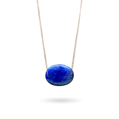 Lapis Lazuli is known as the stone of friendship and a crystal of truth. This natural Lapis Lazuli gemstone is polished into an oval cabochon and strung on a dainty 14K gold-fill rose gold cable chain, which has been doubled up on both sides, and completed with a vintage-inspired pearl box clasp.