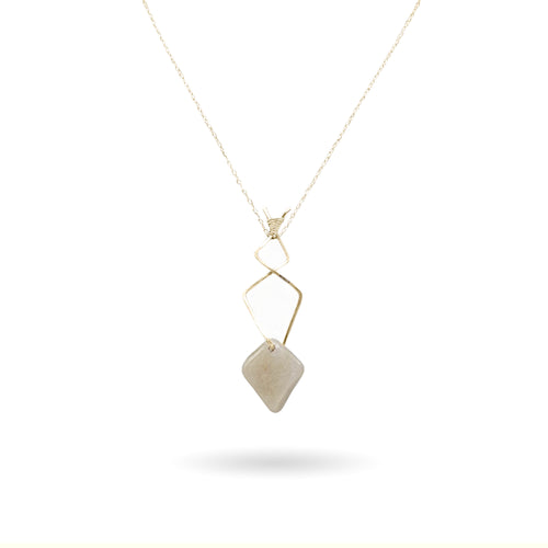 Earthy, artful and sophisticated, this diamond-shaped Rutilated Milky Quartz pendant is set on a geometric-shaped 14K gold-filled wire, dainty rectangle paper clip cable chain, and vintage-inspired pearl box clasp. The necklace has an almost avant-garde look to it. The Quartz stone used here gets its unique look from golden rutile needles.