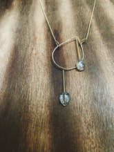 Load image into Gallery viewer, Earthy, artful and sophisticated, these pear-shaped Rutilated Quartz dangle separately from an asymmetrical 14K gold-filled teardrop pendant, attached to a dainty curb chain and a pearl box clasp
