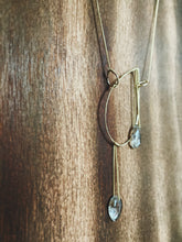 Load image into Gallery viewer, Earthy, artful and sophisticated, these pear-shaped Rutilated Quartz dangle separately from an asymmetrical 14K gold-filled teardrop pendant, attached to a dainty curb chain and a pearl box clasp
