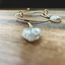 Load image into Gallery viewer, Earthy, artful and sophisticated, these pear-shaped Rutilated Quartz dangle separately from an asymmetrical 14K gold-filled teardrop pendant, attached to a dainty curb chain and a pearl box clasp
