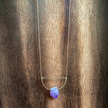 Load image into Gallery viewer, A pastel purple crystal point of Fluorite hangs from a hammered 14K gold-fill half-circle pendant and is strung along a dainty 14K gold-fill curb chain, then finished with a vintage-inspired pearl box clasp. 
