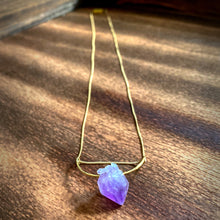 Load image into Gallery viewer, A pastel purple crystal point of Fluorite hangs from a hammered 14K gold-fill half-circle pendant and is strung along a dainty 14K gold-fill curb chain, then finished with a vintage-inspired pearl box clasp. 
