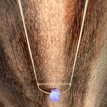 Cargar imagen en el visor de la galería, A pastel purple crystal point of Fluorite hangs from a hammered 14K gold-fill half-circle pendant and is strung along a dainty 14K gold-fill curb chain, then finished with a vintage-inspired pearl box clasp. 
