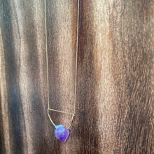 Cargar imagen en el visor de la galería, A pastel purple crystal point of Fluorite hangs from a hammered 14K gold-fill half-circle pendant and is strung along a dainty 14K gold-fill curb chain, then finished with a vintage-inspired pearl box clasp. 
