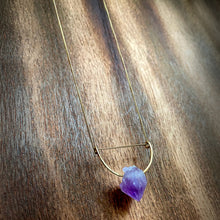 Load image into Gallery viewer, A pastel purple crystal point of Fluorite hangs from a hammered 14K gold-fill half-circle pendant and is strung along a dainty 14K gold-fill curb chain, then finished with a vintage-inspired pearl box clasp. 
