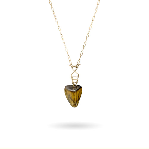 This silky, lustrous Tiger’s Eye gemstone is in the shape of a smooth, tactile inverted pyramid and held in place with a structure, twisting 14K gold-fill wire pendant and attached to a 14K gold-fill paper clip style cable chain with decorative gold open circles, finished with a vintage-inspired pearl box clasp. 